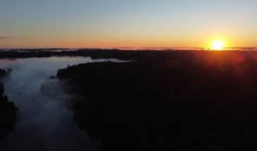 Sunrise over the forest in the boundary waters canoe area
