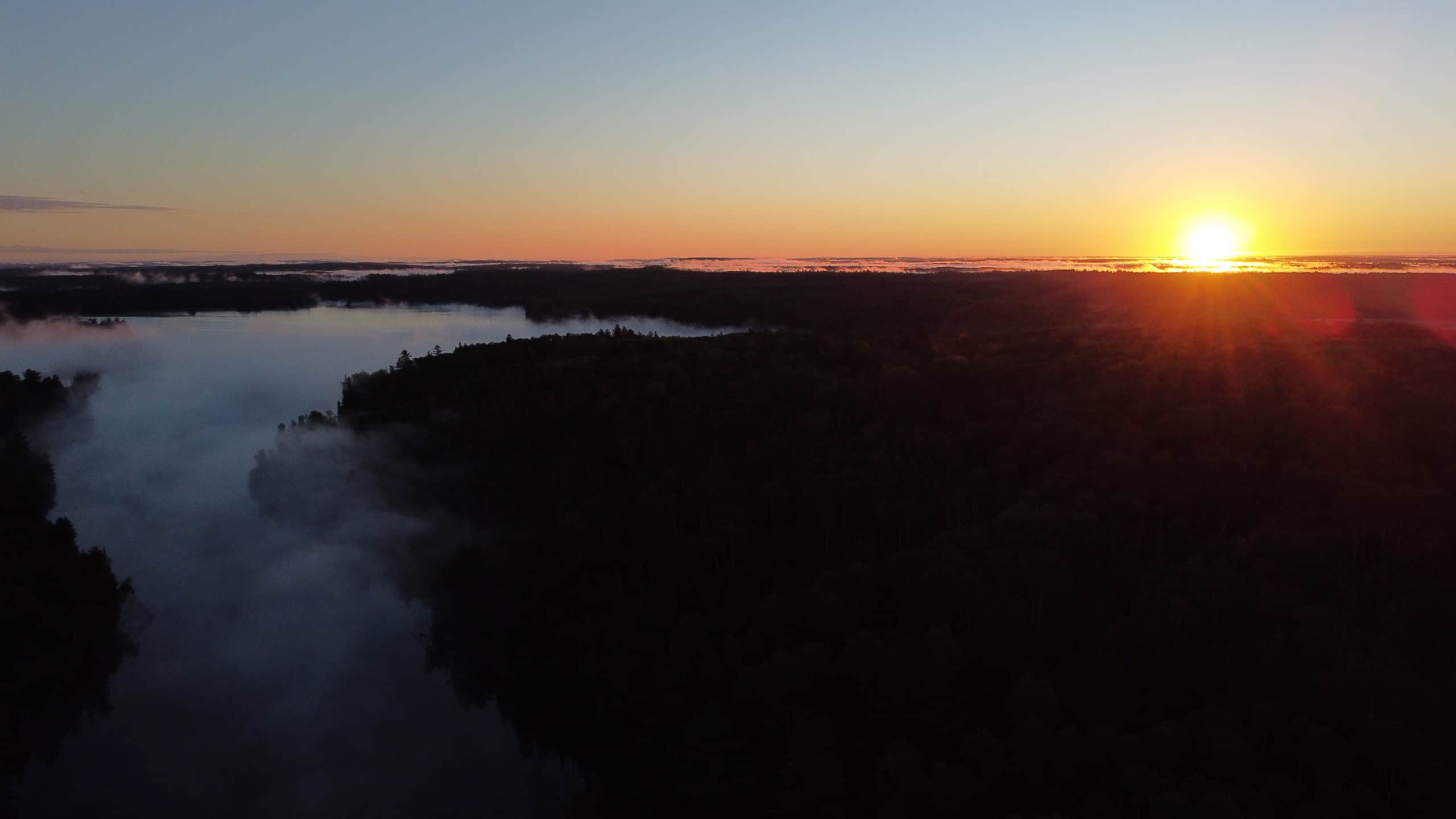 Sunrise over the forest in the boundary waters canoe area