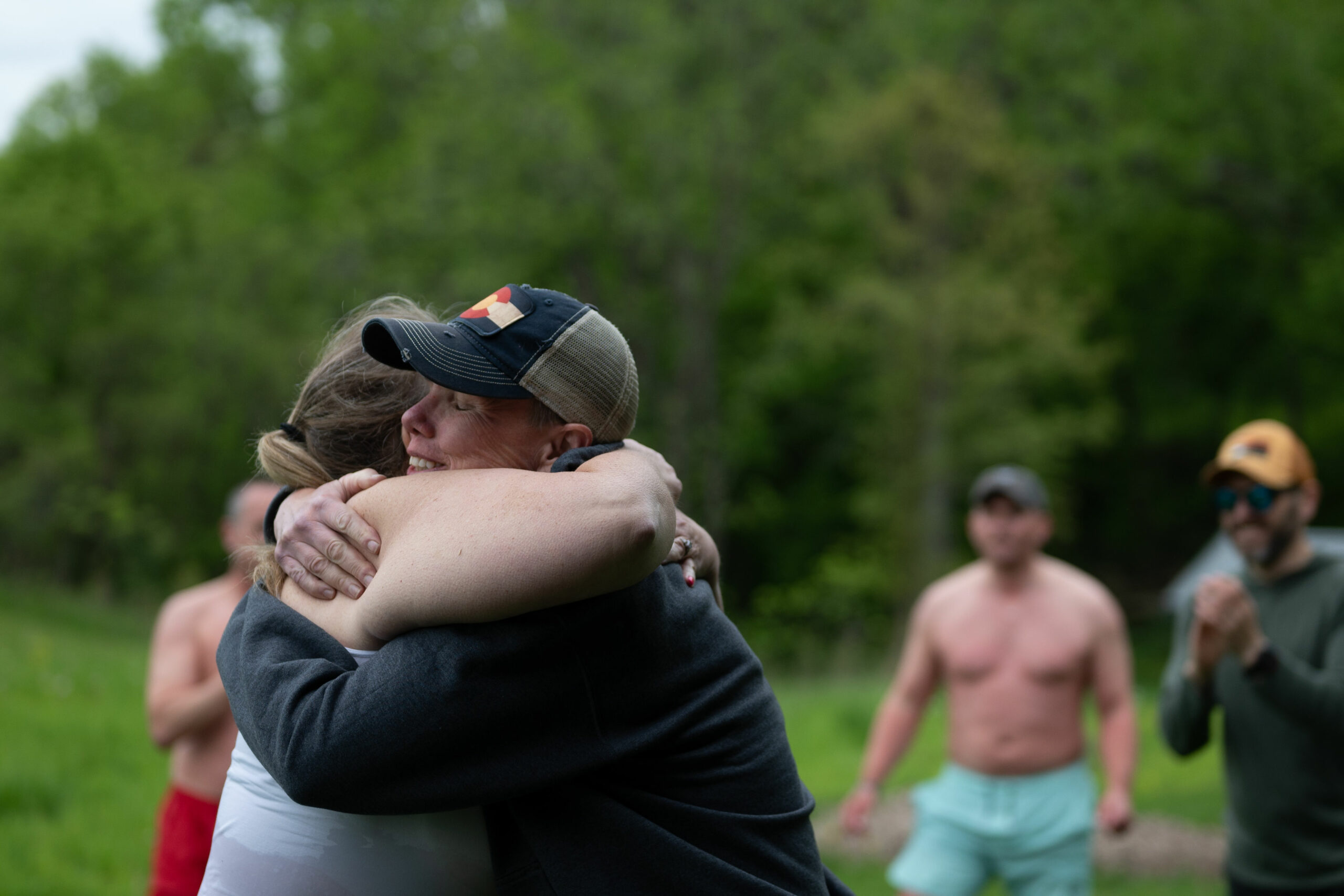 Two people hugging at The Great Midwestern Reset Retreat