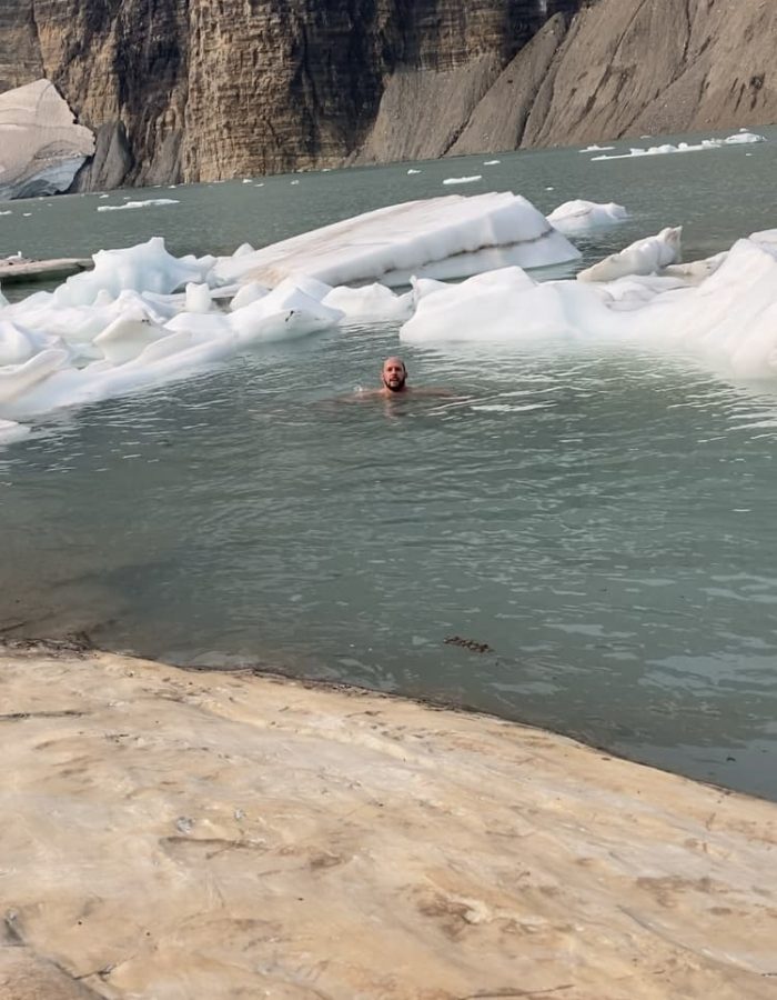 Anthony swimming on cold river water