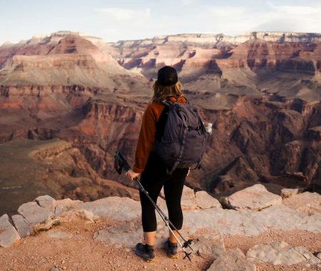 Girl standing above Grand Canyon